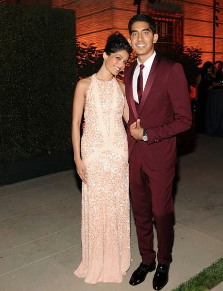 BEVERLY HILLS, CA - OCTOBER 17: Actors Freida Pinto (L) and Dev Patel attend the Wallis Annenberg Center for the Performing Arts Inaugural Gala presented by Salvatore Ferragamo at the Wallis Annenberg Center for the Performing Arts on October 17, 2013 in Beverly Hills, California. (Photo by Stefanie Keenan/Getty Images for Wallis Annenberg Center for the Performing Arts)