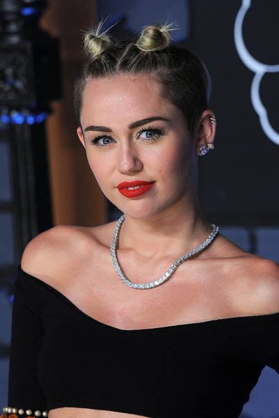 her-hair-little-grown-out-miley-spotted-sporting-double-topknots-2013-mtv-vmas-incidentally-style-quite-conducive-twerking-because-you-dont-have-worry-about-getting-hair-your-face