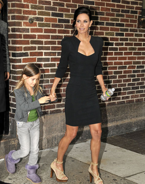 Courteney Cox holds hands with daughter Coco Riley while leaving "The Late Show with David Letterman"