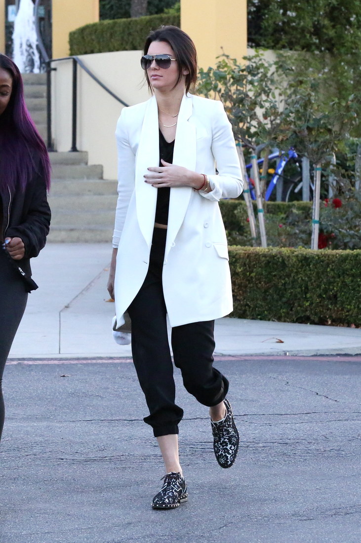 Kendall Jenner was spotted at Sugarfish in Calabasas, enjoying a mellow afternoon with friends. The reality star went with a black outfit under a white sports coat, on Saturday, January 3, 2015, X17online.com