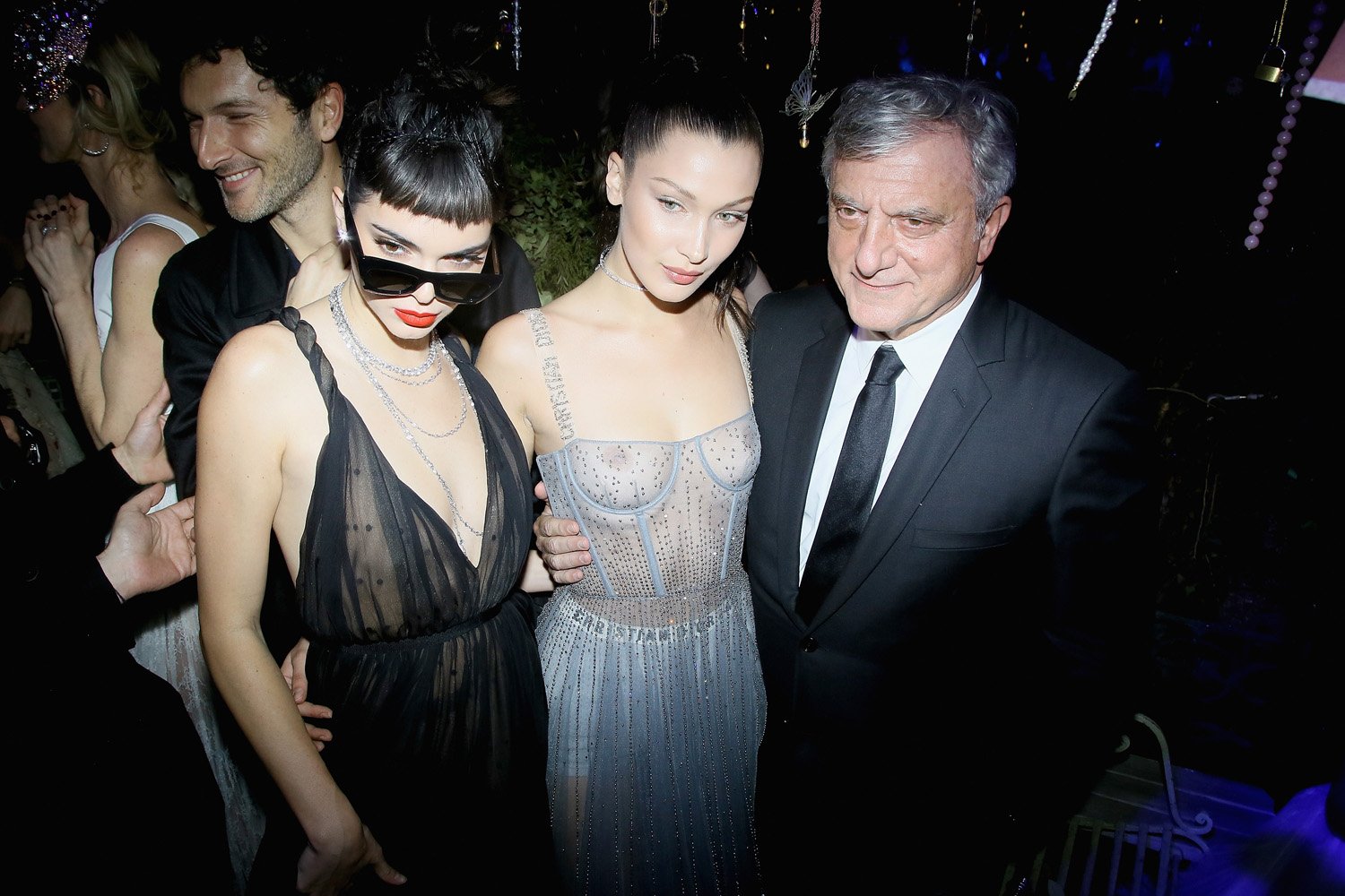 PARIS, FRANCE - JANUARY 23: (L to R) Kendall Jenner, Bella Hadi and Sidney Toledano attend the Christian Dior Haute Couture Spring Summer 2017 Bal Masque as part of Paris Fashion Week on January 23, 2017 in Paris, France. (Photo by Victor Boyko/Getty Images for Dior) *** Local Caption *** Kendall Jenner; Bella Hadid; Sidney Toledano