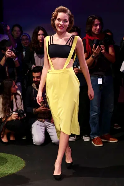 ISTANBUL, TURKEY - OCTOBER 09: A model walks the runway at the Kith & Kin show during Mercedes-Benz Fashion Week Istanbul s/s 2014 presented by American Express on October 9, 2013 in Istanbul, Turkey. (Photo by Vittorio Zunino Celotto/Getty Images for IMG)