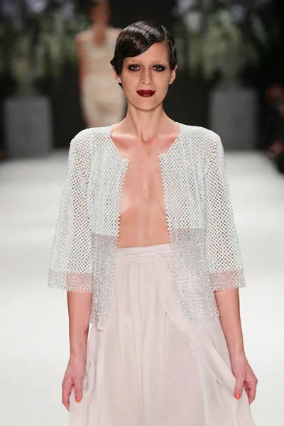 ISTANBUL, TURKEY - OCTOBER 09: A model walks the runway at the Tuvanam show during Mercedes-Benz Fashion Week Istanbul s/s 2014 presented by American Express on October 9, 2013 in Istanbul, Turkey. (Photo by Vittorio Zunino Celotto/Getty Images for IMG)