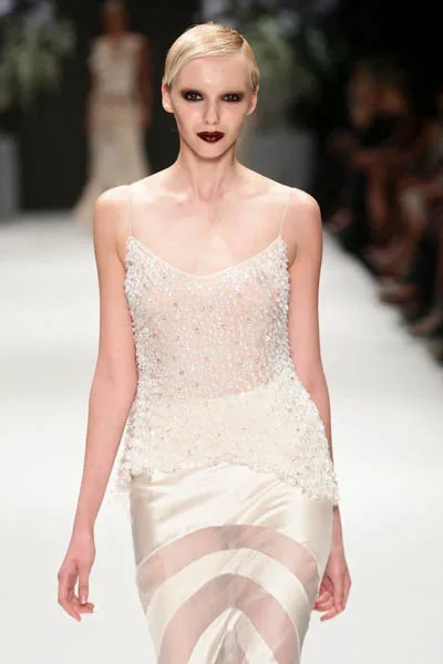 ISTANBUL, TURKEY - OCTOBER 09: A model walks the runway at the Tuvanam show during Mercedes-Benz Fashion Week Istanbul s/s 2014 presented by American Express on October 9, 2013 in Istanbul, Turkey. (Photo by Vittorio Zunino Celotto/Getty Images for IMG)