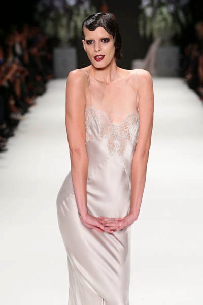 ISTANBUL, TURKEY - OCTOBER 09: A model walks the runway at the Tuvanam show during Mercedes-Benz Fashion Week Istanbul s/s 2014 presented by American Express on October 9, 2013 in Istanbul, Turkey. (Photo by Vittorio Zunino Celotto/Getty Images for IMG)