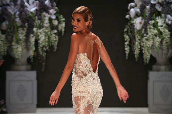 ISTANBUL, TURKEY - OCTOBER 09: A model walks the runway at the Tuvanam show during Mercedes-Benz Fashion Week Istanbul s/s 2014 presented by American Express on October 9, 2013 in Istanbul, Turkey. (Photo by Vittorio Zunino Celotto/Getty Images for IMG)