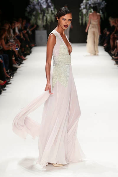 ISTANBUL, TURKEY - OCTOBER 09: A model walks the runway at the Tuvanam show during Mercedes-Benz Fashion Week Istanbul s/s 2014 presented by American Express on October 9, 2013 in Istanbul, Turkey. (Photo by Vittorio Zunino Celotto/Getty Images for IMG)