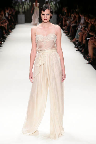 ISTANBUL, TURKEY - OCTOBER 09: A model walks the runway at the Tuvanam show during Mercedes-Benz Fashion Week Istanbul s/s 2014 presented by American Express on October 9, 2013 in Istanbul, Turkey. (Photo by Vittorio Zunino Celotto/Getty Images for IMG)