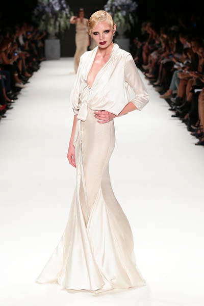 ISTANBUL, TURKEY - OCTOBER 09: A model walks the runway at the Tuvanam show during Mercedes-Benz Fashion Week Istanbul s/s 2014 presented by American Express on October 9, 2013 in Istanbul, Turkey. (Photo by Vittorio Zunino Celotto/Getty Images for IMG)