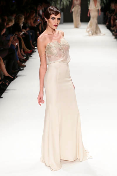 ISTANBUL, TURKEY - OCTOBER 09: A model walks the runway at the Tuvanam show during Mercedes-Benz Fashion Week Istanbul s/s 2014 presented by American Express on October 9, 2013 in Istanbul, Turkey. (Photo by Vittorio Zunino Celotto/Getty Images for IMG)