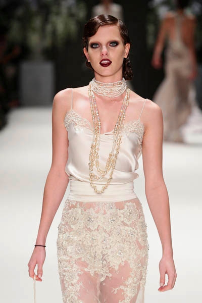 ISTANBUL, TURKEY - OCTOBER 09: A model walks the runway at the Tuvanam show during Mercedes-Benz Fashion Week Istanbul s/s 2014 presented by American Express on October 9, 2013 in Istanbul, Turkey. (Photo by Vittorio Zunino Celotto/Getty Images for IMG)