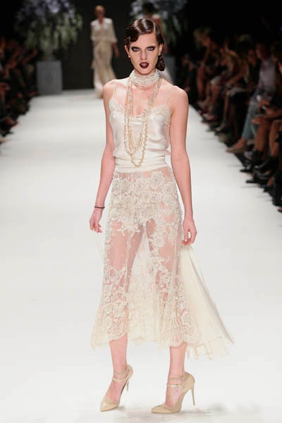 ISTANBUL, TURKEY - OCTOBER 09: A model walks the runway at the Tuvanam show during Mercedes-Benz Fashion Week Istanbul s/s 2014 presented by American Express on October 9, 2013 in Istanbul, Turkey. (Photo by Vittorio Zunino Celotto/Getty Images for IMG)