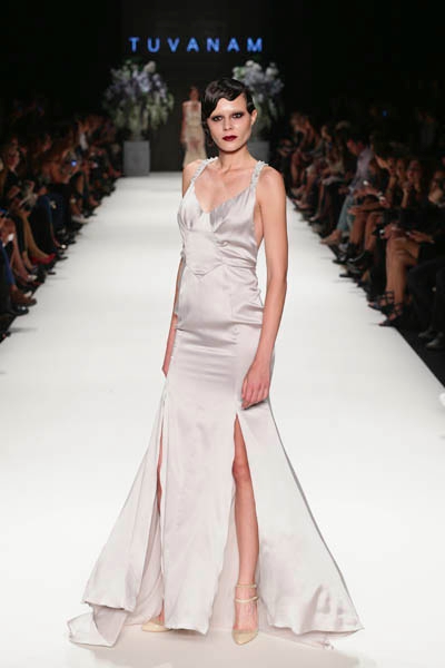 ISTANBUL, TURKEY - OCTOBER 09: A model walks the runway at the Tuvanam show during Mercedes-Benz Fashion Week Istanbul s/s 2014 presented by American Express on October 9, 2013 in Istanbul, Turkey. (Photo by Vittorio Zunino Celotto/Getty Images for IMG)
