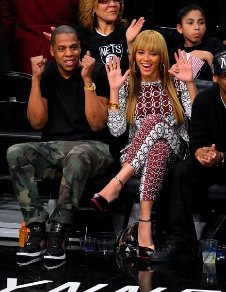 NEW YORK, NY - NOVEMBER 03: Jay-Z and Beyonce Knowles attend Toronto Raptors vs Brooklyn Nets game at Barclays Center on November 3, 2012 in Brooklyn, New York. (Photo by James Devaney/FilmMagic)