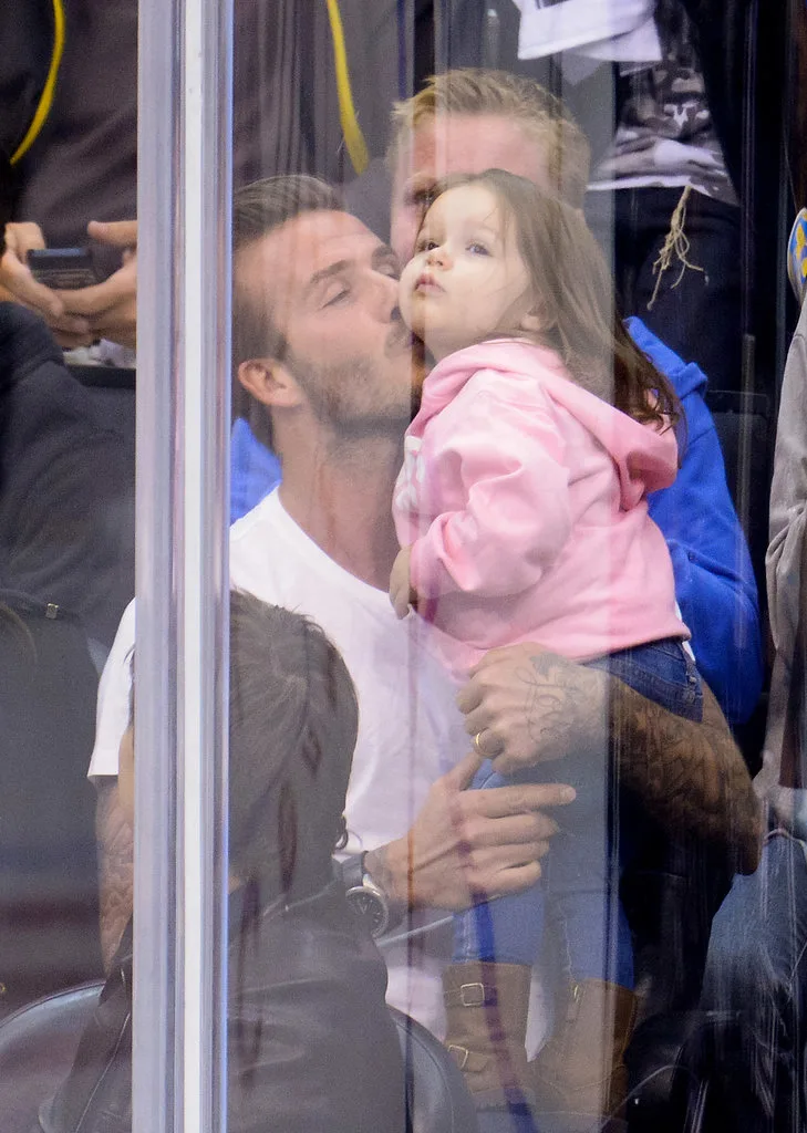 May-2013-David-planted-sweet-kiss-Harper-LA-Kings-game